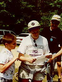 Susan reading a message in a bottle.