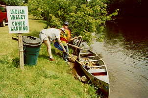  
 Unloading trash from canoes at Indian Valley.
